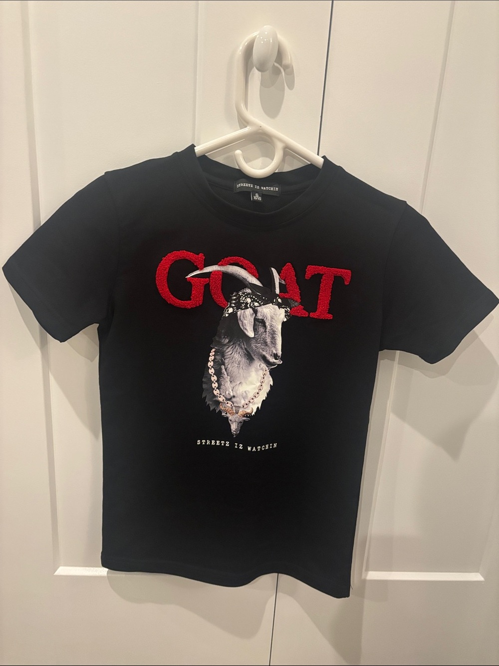 GOAT Graphic Tee in Black with Red Lettering